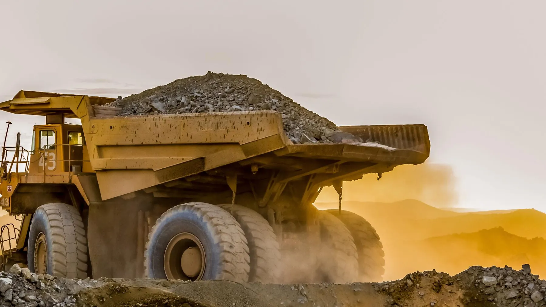 Heavy haul truck loaded with ore at an open-pit mine